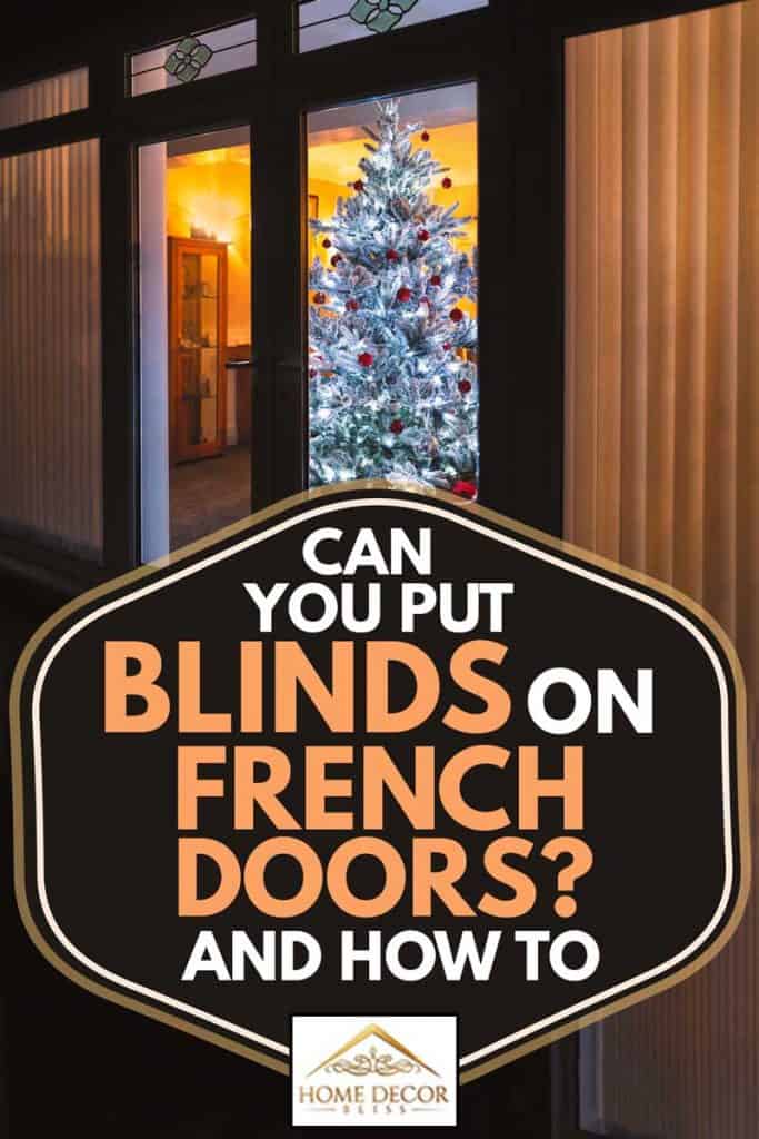 Frosted white artificial christmas tree with red and silver decorations seen through large french doors with vertical slat blinds, Can You Put Blinds On French Doors? (And How To)