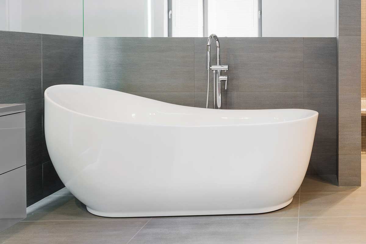 Freestanding bathtub in modern bathroom, How to Install A New Bathtub (Including Renovation Cost)
