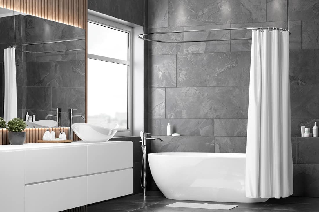 Interior of a luxurious modern house with a white shower liner