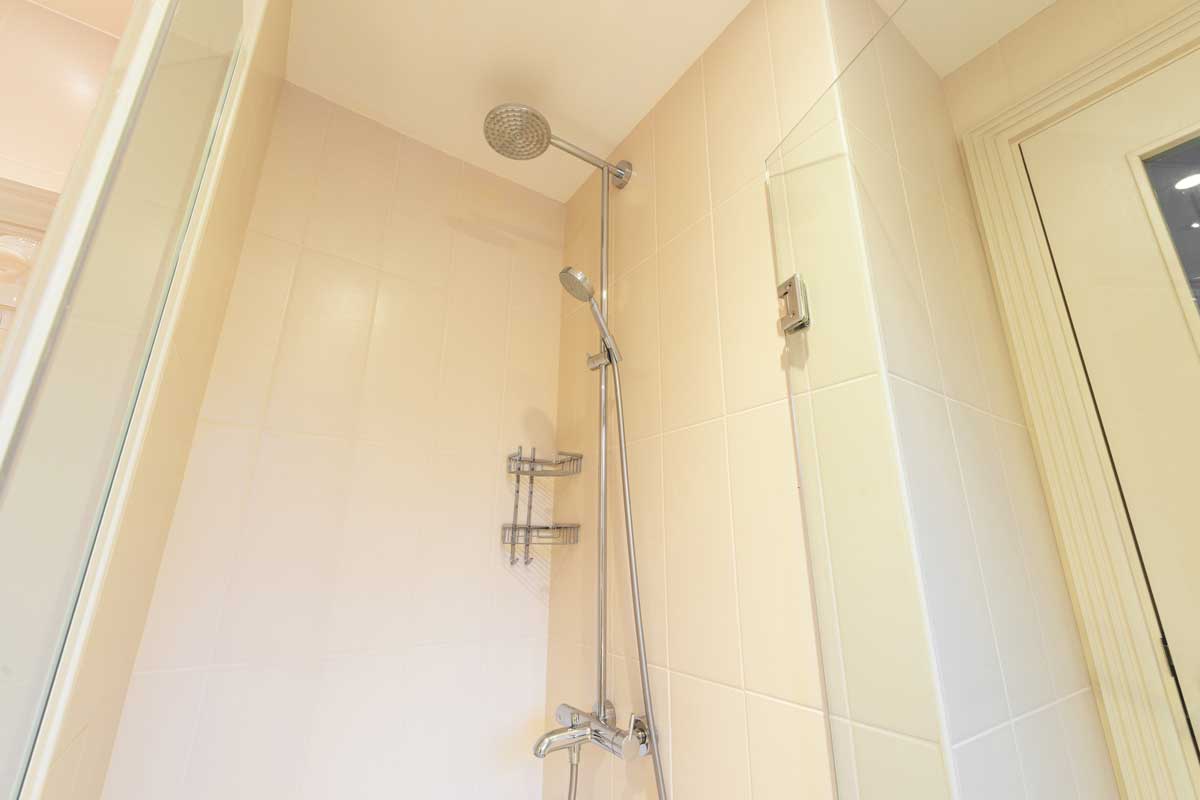 Interior of a modern bathroom shower, Here's The Easiest Type of Shower To Clean