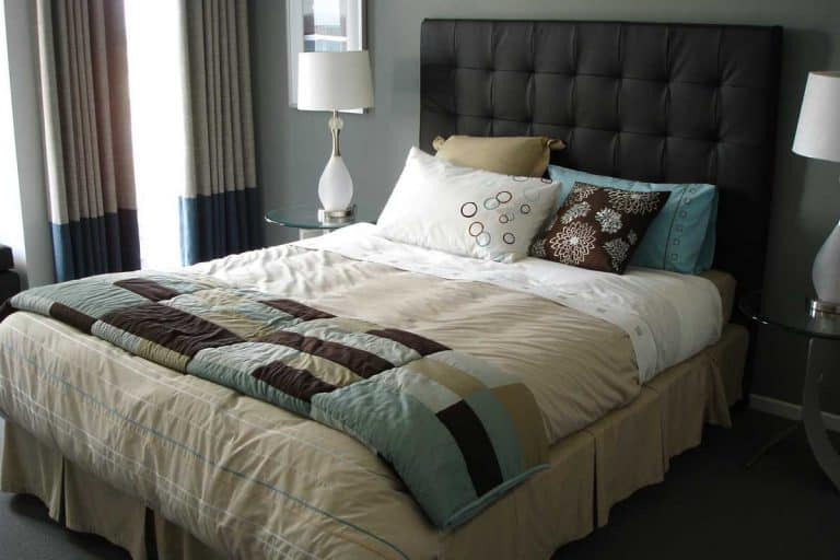 Luxurious master bedroom with padded headboard on bed, How To Make A Padded Headboard