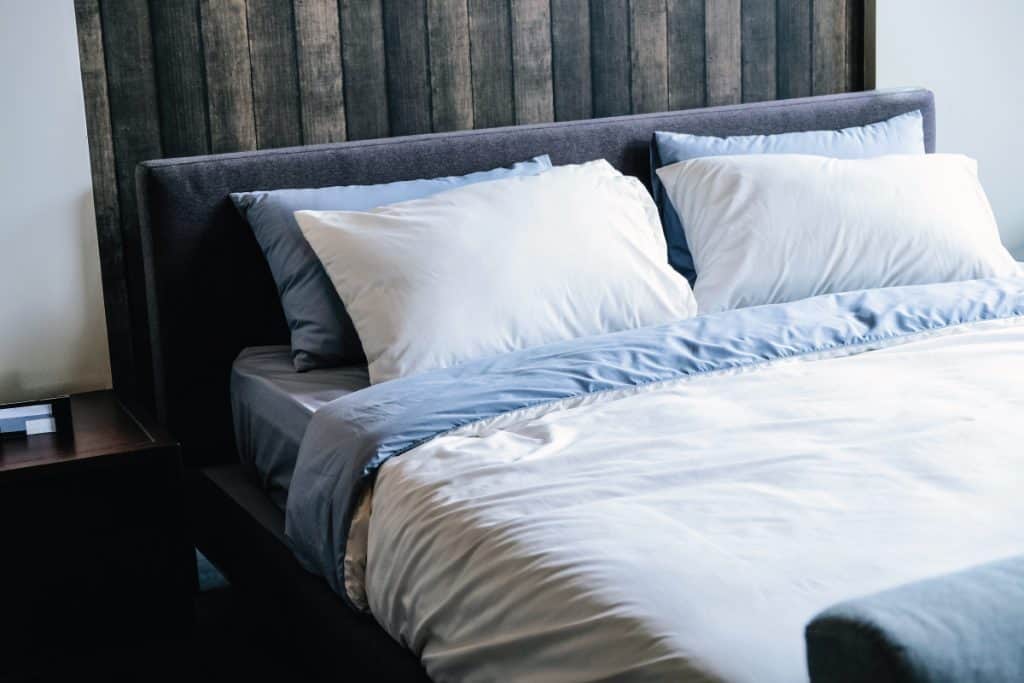 Modern white bed and pillow in morning mood