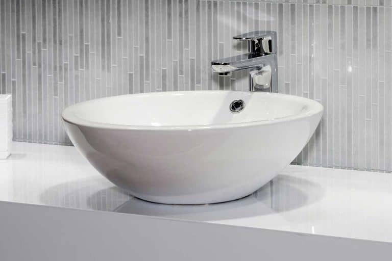 Modern white sink in bathroom interior, How To Repair A Cracked Or Chipped Bathroom Sink