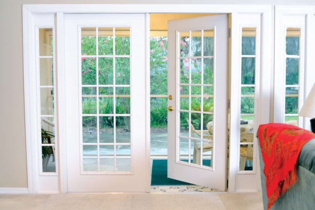 Open white french doors without curtains