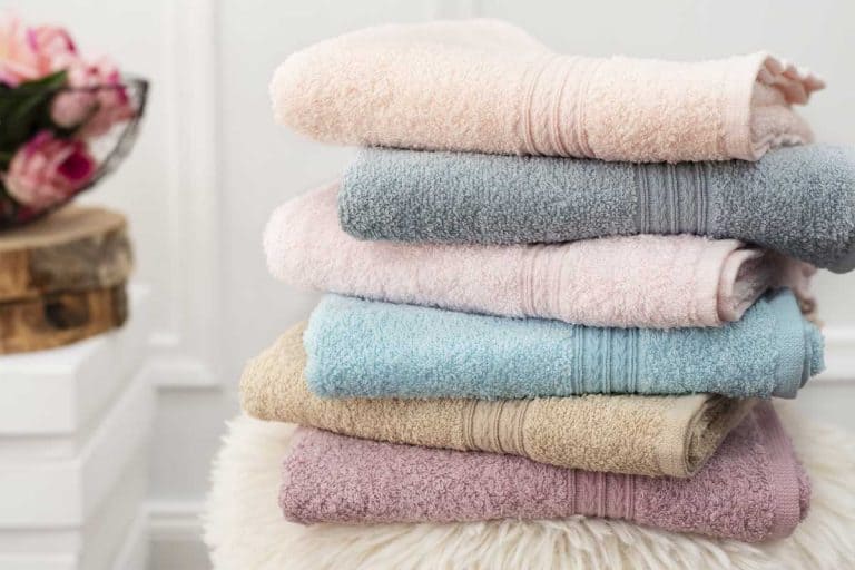 Stack of clean soft colorful towels, 6 Best Egyptian Cotton Towels [And how to choose yours]