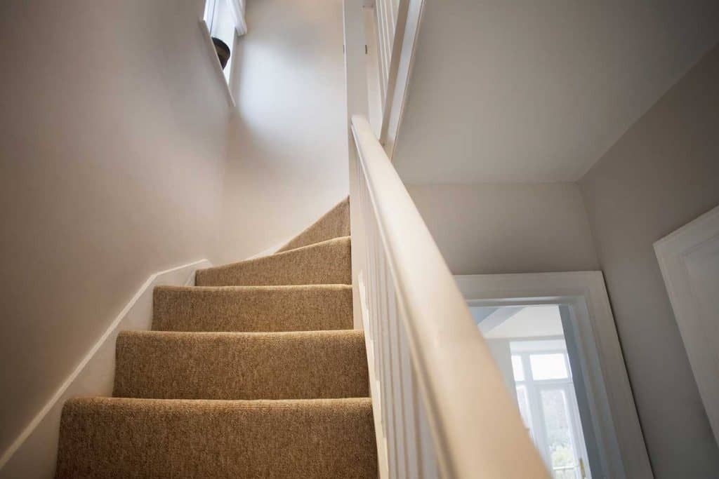 Stairs and stair carpet inside a newly modernized house