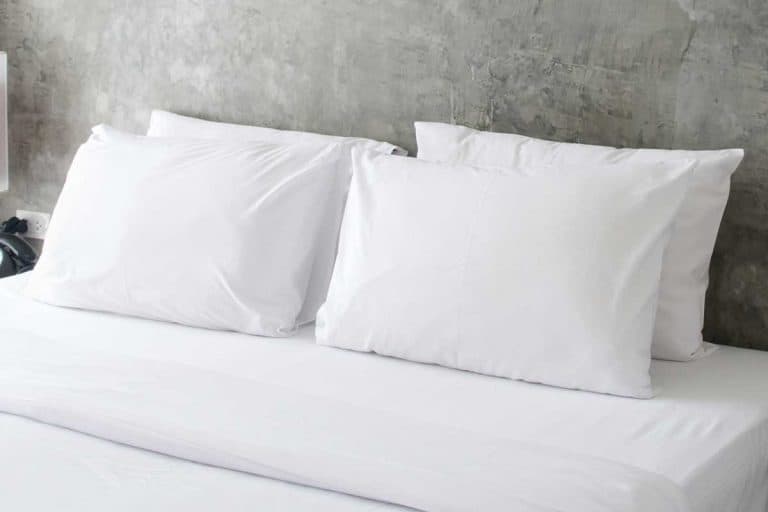 Tidy bed with white pillows and bed sheet, 10 Types Of Filling Materials For Pillows