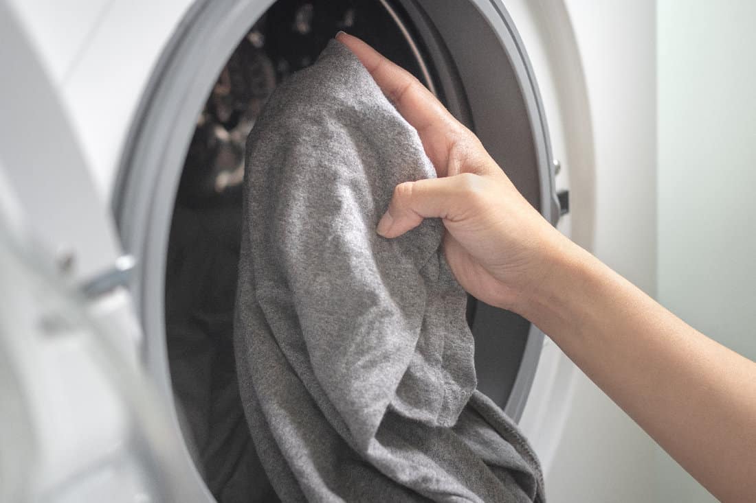 Washing gray pillowcase in washing machine