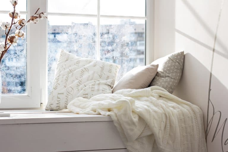 Cushions and a knitted plaid on the windowsill, What Are the Standard Sizes of Pillowcases?