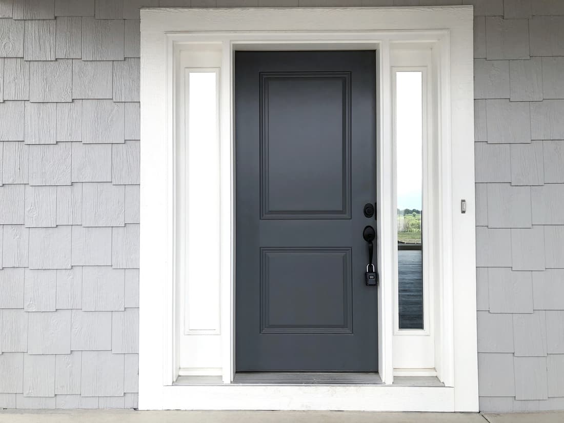 gray front door with shingle siding in white, How To Paint A Front Door Without Removing It? [5 Steps]