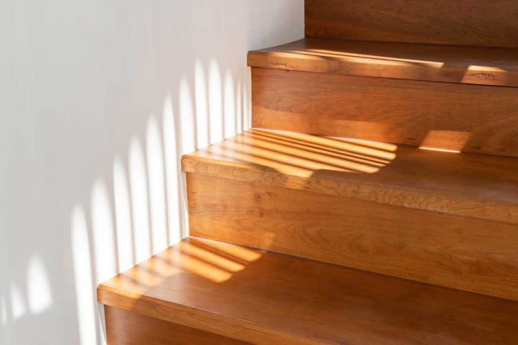 Light and shadow on wooden stair steps