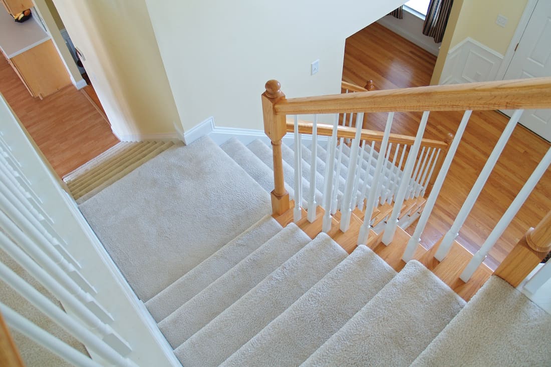 white carpeted stairway, How Long Does Carpet Last on Stairs