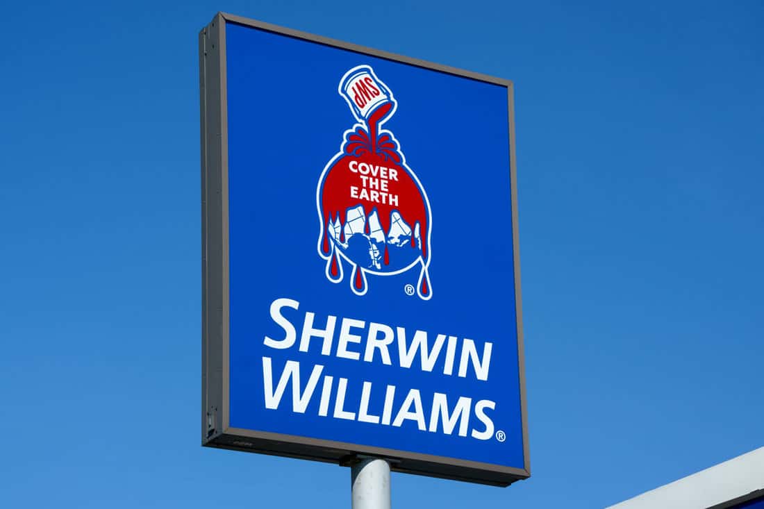 Sherwin Williams signage photographed on a sunny day, What Sherwin Williams Paint Is Best For Cabinets?