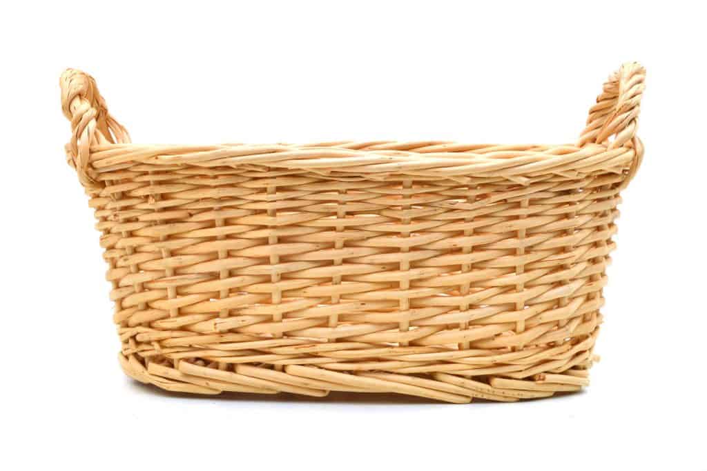 A small laundry basket isolated on a white background