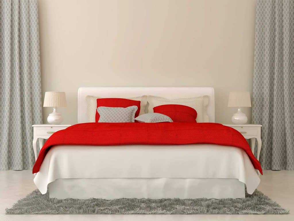 Bedroom with red and gray decorations
