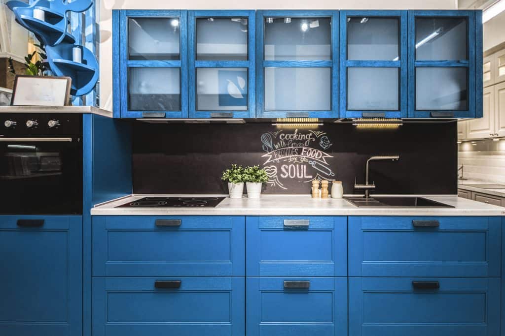 Blue cabinets inside a classic kitchen