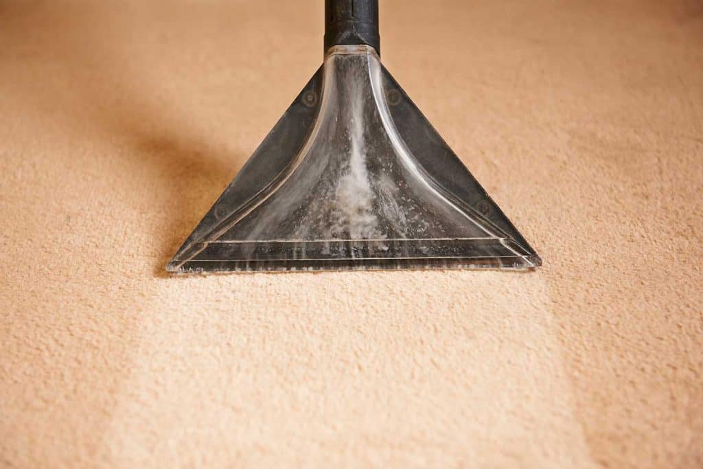 Cleaning carpets with vacuum cleaner
