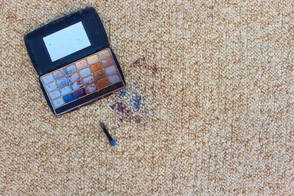 Eye shadow fell and scattered on carpet
