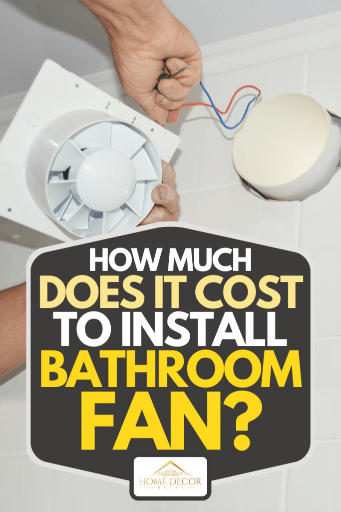 Un bricoleur installant un nouveau ventilateur de baignoire, un système de ventilation dans la salle de bain de la maison, combien coûte l'installation d'un ventilateur de salle de bain ?