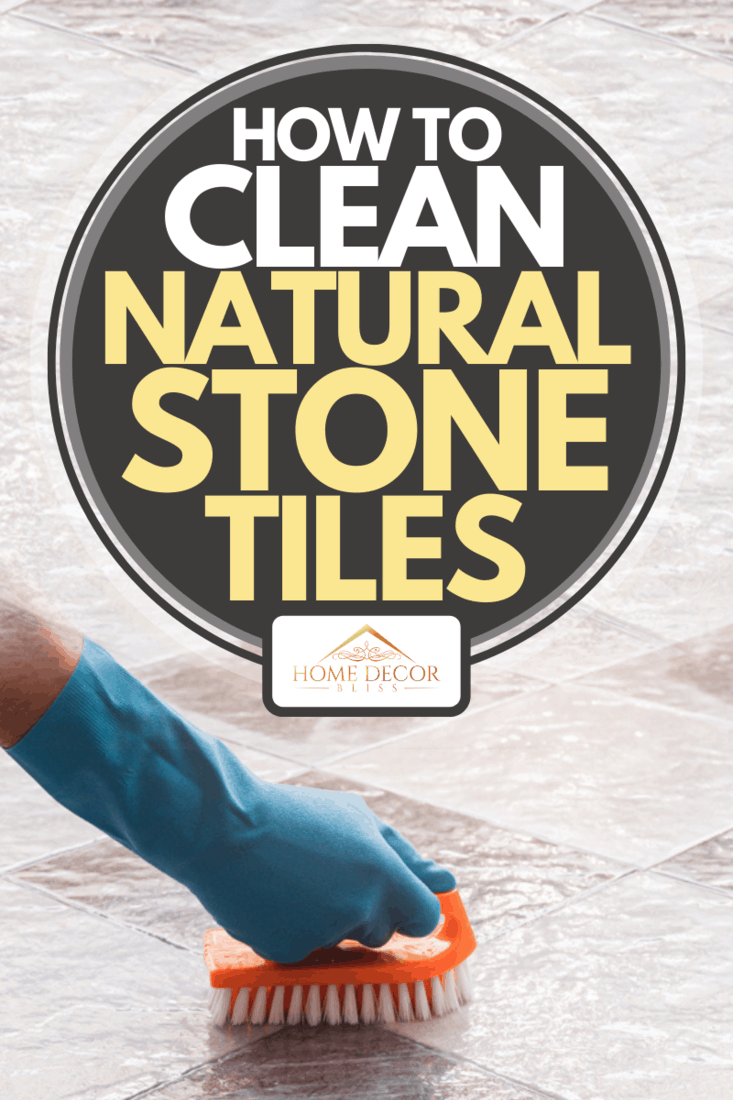A man wearing blue rubber gloves cleaning the tile floor with scrub, How To Clean Natural Stone Tiles