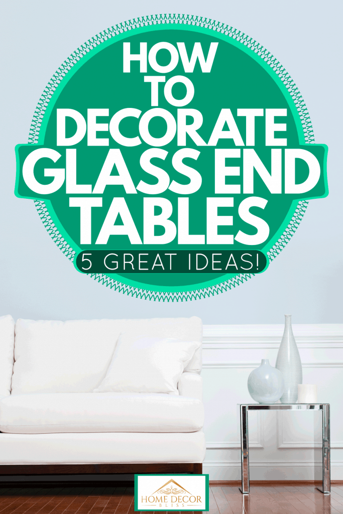 White sofa with white throw pillows and an end table with metal framing on the side, How To Decorate Glass End Tables [5 Great Ideas!]
