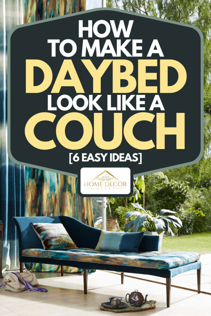 A vibrant daybed with cushions in modern home, How To Make A Daybed Look Like A Couch [6 EASY Ideas]
