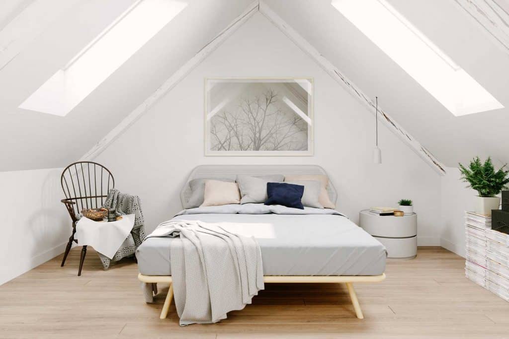 Interior of a Scandinavian style attic bedroom