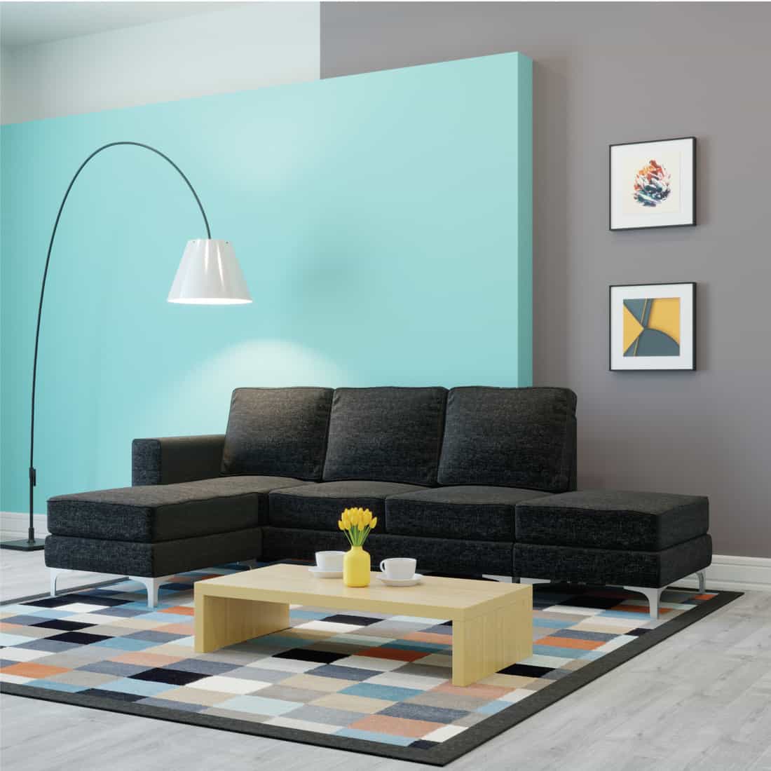 Living room in gray-blue color concept, black sofa and light blue wall behind