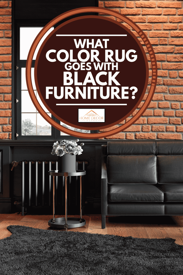 Loft interior with brickwall, leather couch, wood panel, window and rug, What Color Rug Goes With Black Furniture?