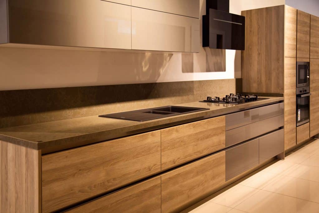 Luxurious modern kitchen with oak paneled cabinets
