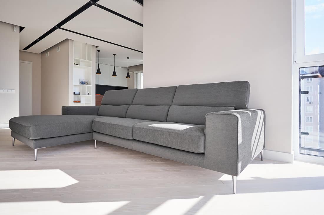 Modern gray L shape sofa in living room