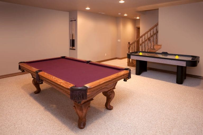 New Game Room With Pool and Air Hockey Tables in the basement with carpet, Best Carpet Types and Colors For The Basement