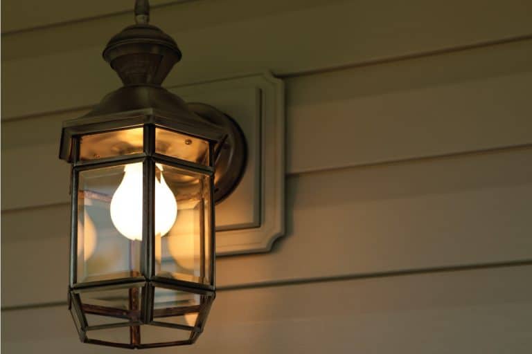 Night time shot of a porch light, How To Keep Bugs Away From The Porch Light [5 Ways!]