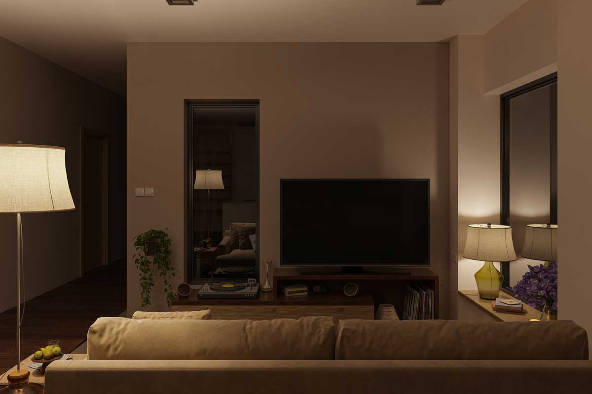 Softly illuminated living room with furniture at night, Does The Couch Have To Face The TV?