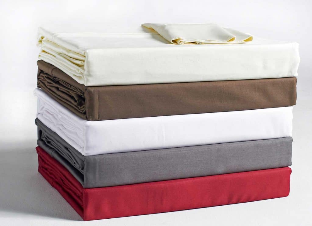 Stacked and folded bed sheets