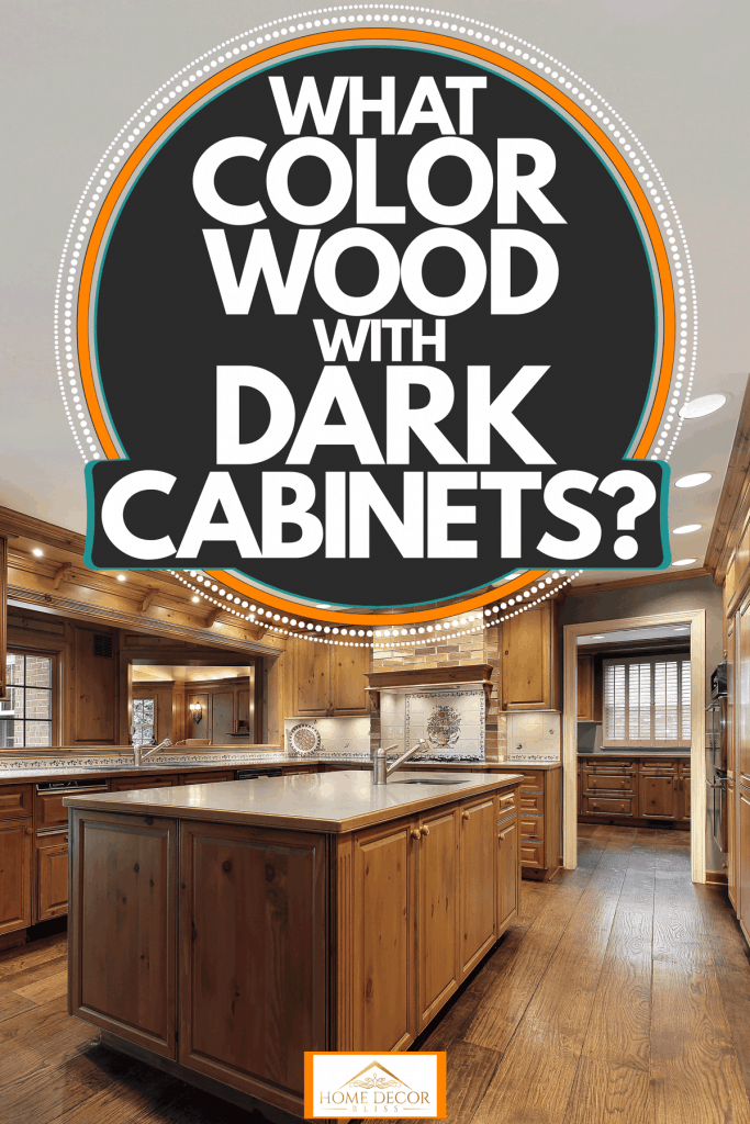 A craftsman inspired kitchen area with wooden cabinetry, wooden flooring, and granite countertops, What Color Wood Floor With Dark Cabinets?