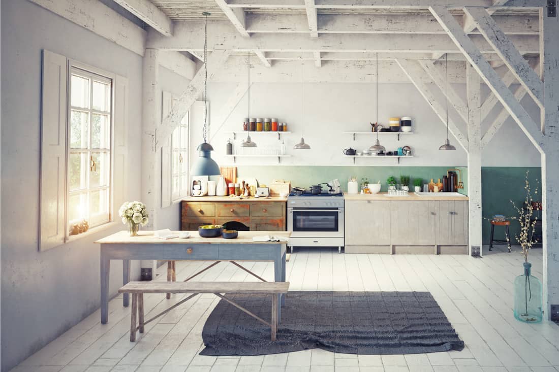 Vintage style kitchen interior with gray flooring and washout white walls, table, and chairs, with appliances in the far end, What Color Furniture Goes With Gray Flooring?