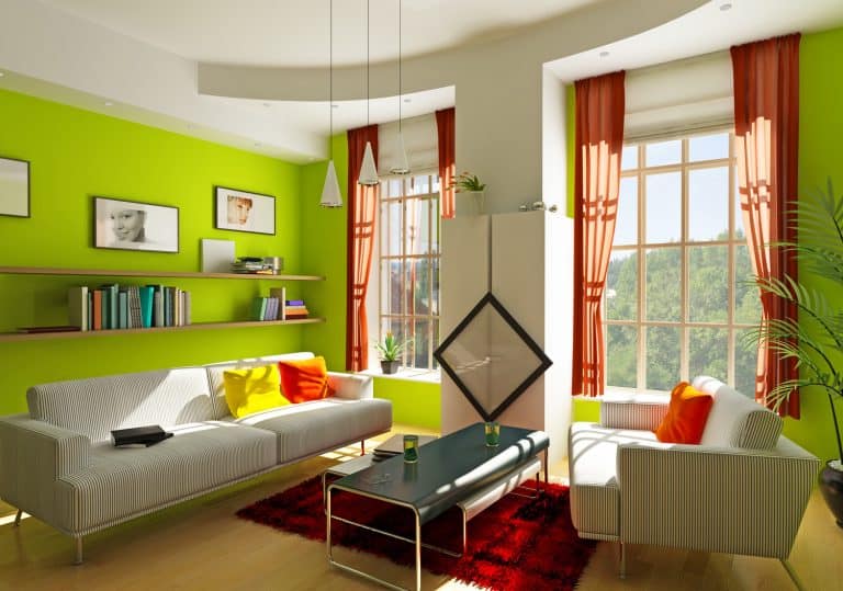 Modern green themed living room, 9 Great Apartment Living Room Layouts