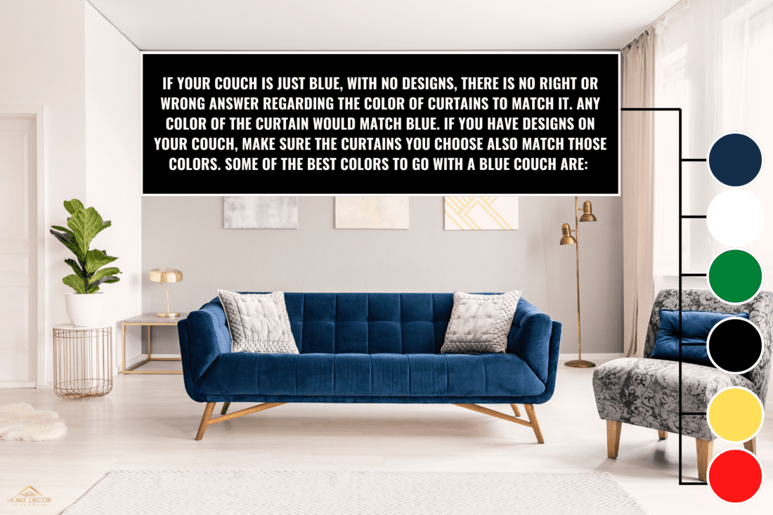 A modern living room interior of a luxurious hotel apartment with a designer couch, an armchair and art decorations. - What Curtains Go With A Blue Couch
