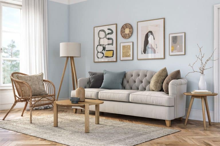 Bohemian living room interior with beige colored furniture and wooden elements and light blue colored wall, Is A Den Considered a Bedroom?