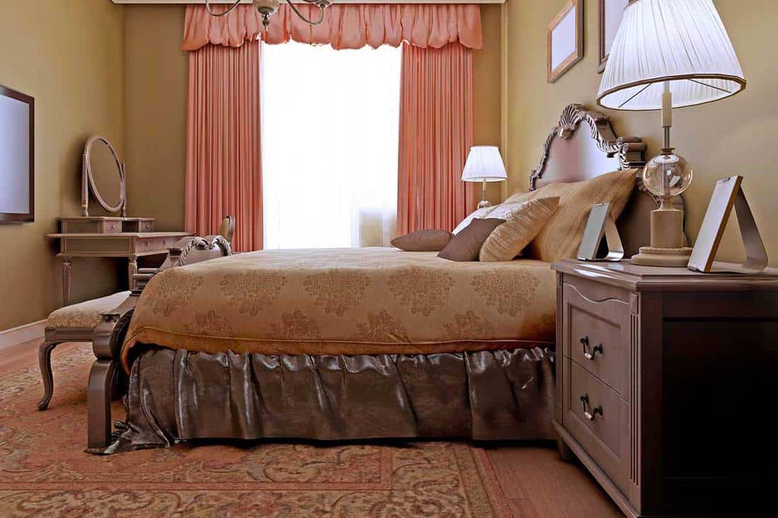 Classic English bedroom design with carpet floor and curtains on window, What Curtains Go With Brown Carpet? [9 Awesome options]