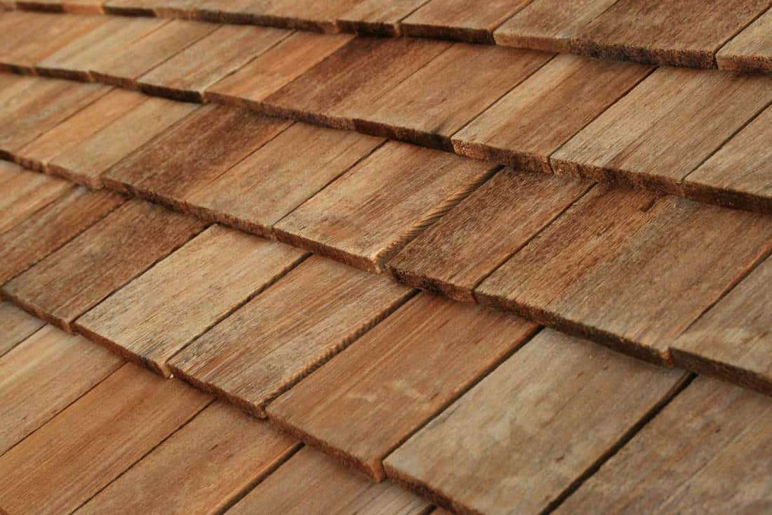 Diagonal detail of brown wood roof shingles, How Big Are Wood Shingles?