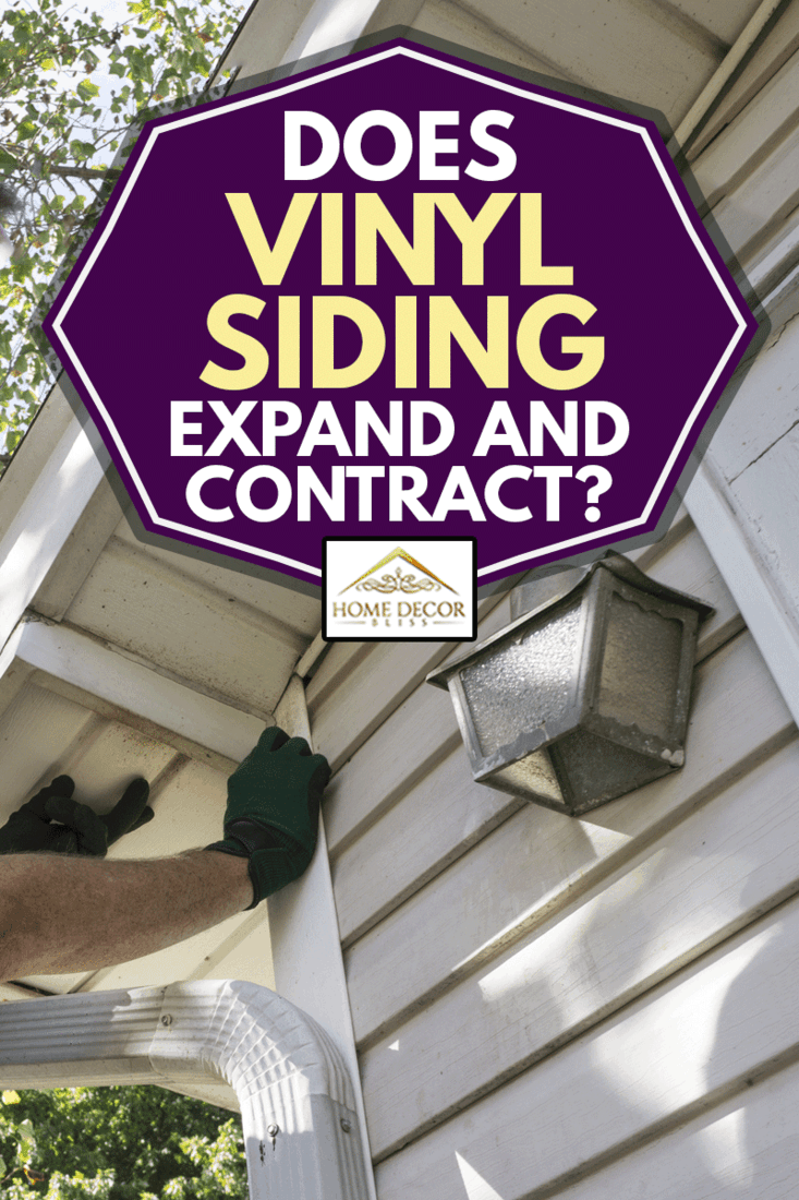 Contractor popping vinyl siding back in place for a customer., Does Vinyl Siding Expand And Contract?