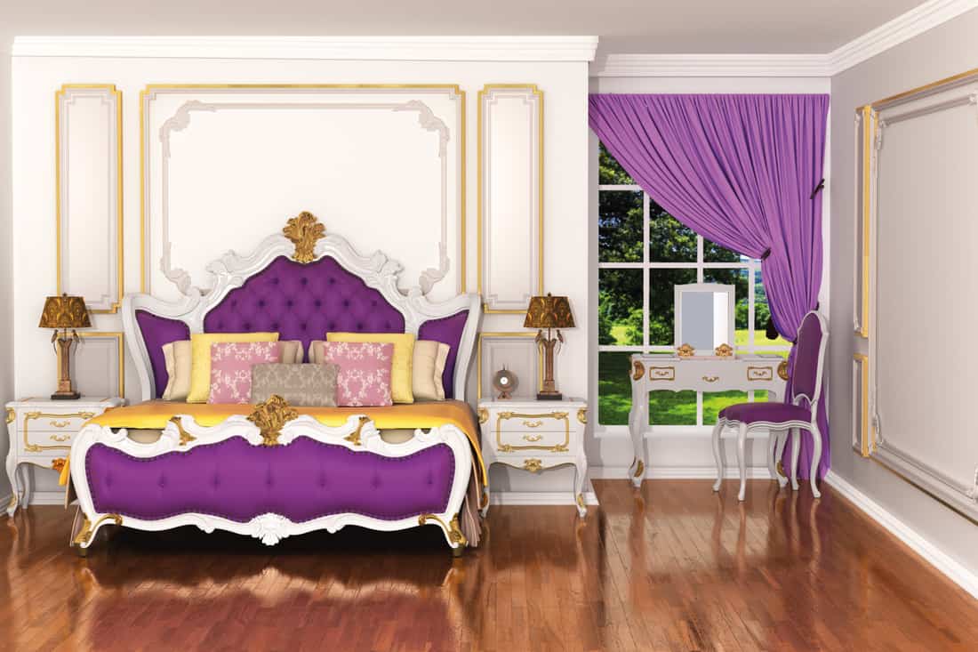 Expensive interior of bohemian bedroom with luxury bedchamber, textured wall with molding and mahogany parquet flooring