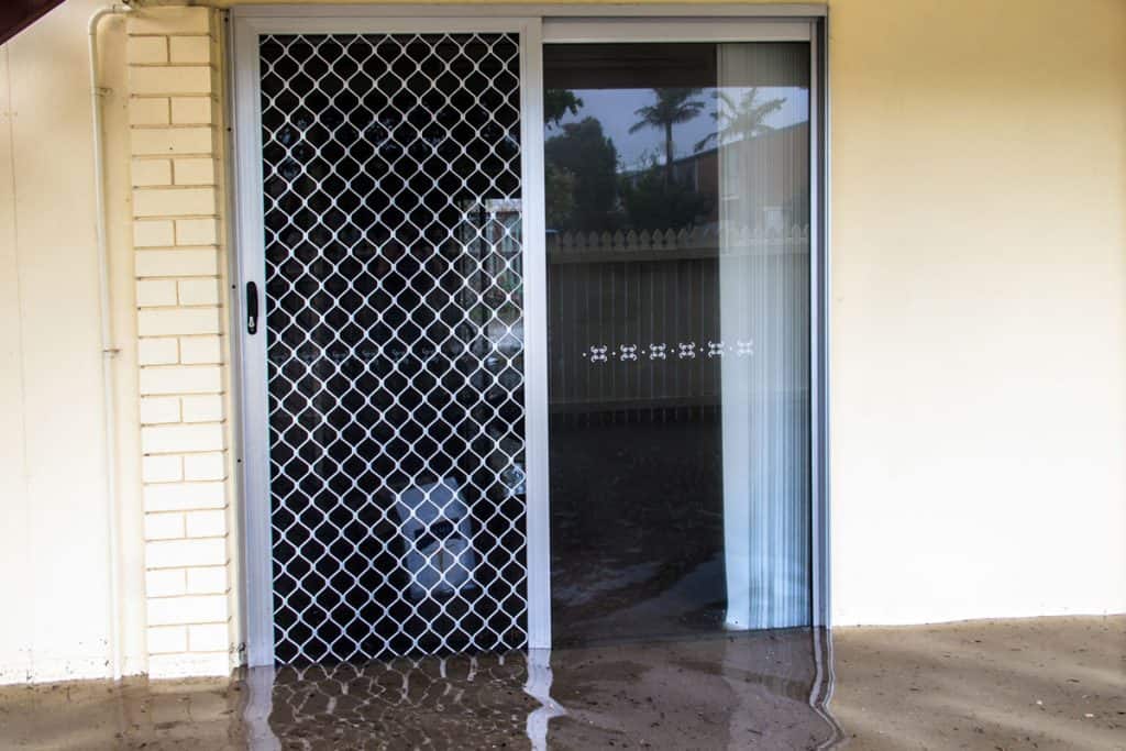 Flooded aluminum storm door