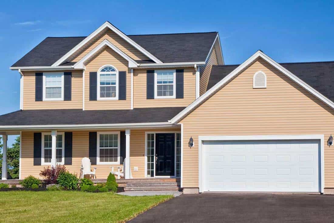Large family home in a rural area with garden, How Long Does Vinyl Siding Last On A House?