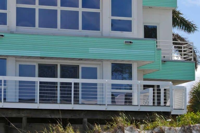 Luxurious beach house with screen doors and glass windows, 17 Amazing Screen Door Ideas