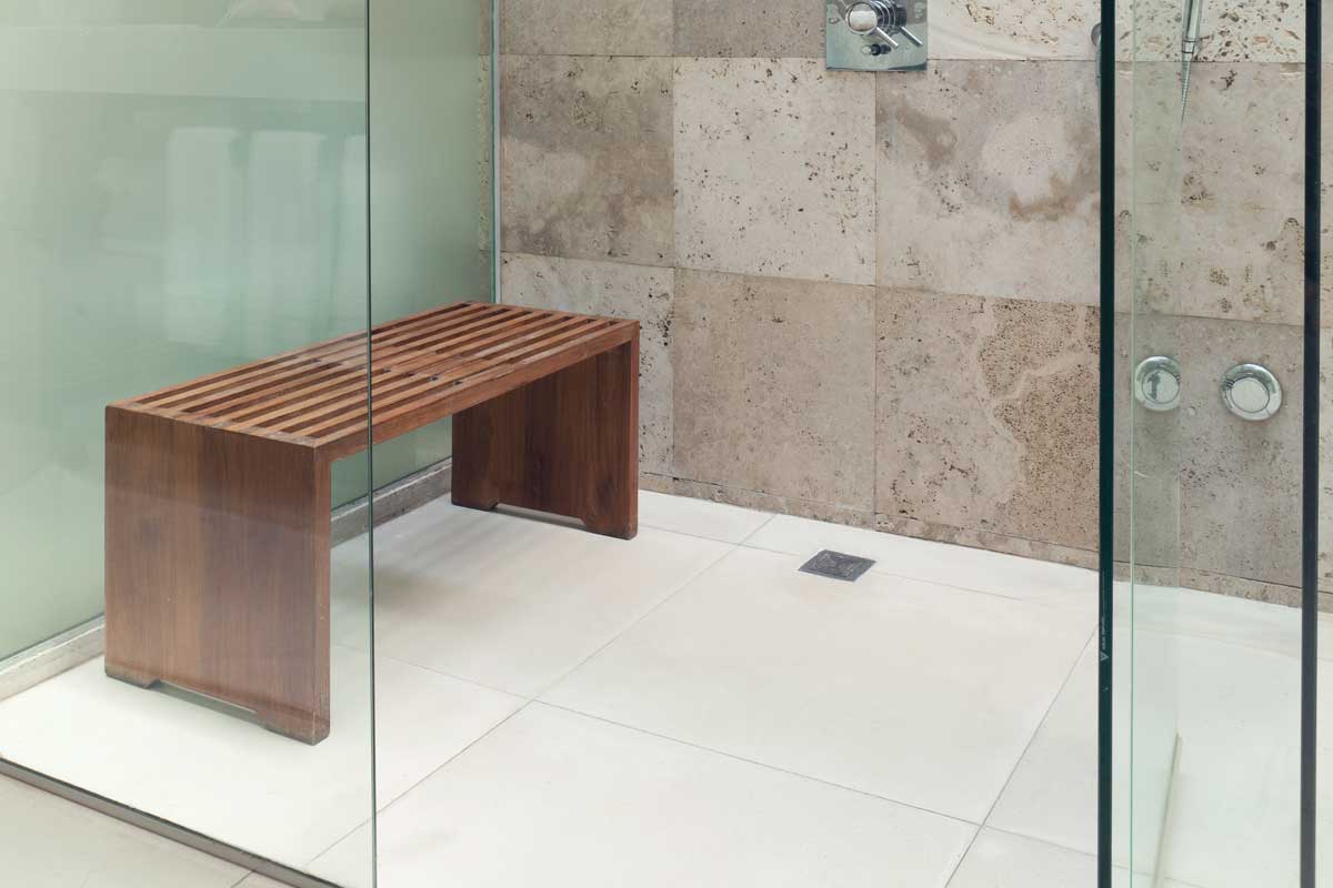 Modern rain shower with a wooden bench, What Is The Best Material For A Shower Bench?