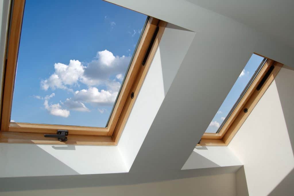 Roof skylight windows of a mansard bedroom