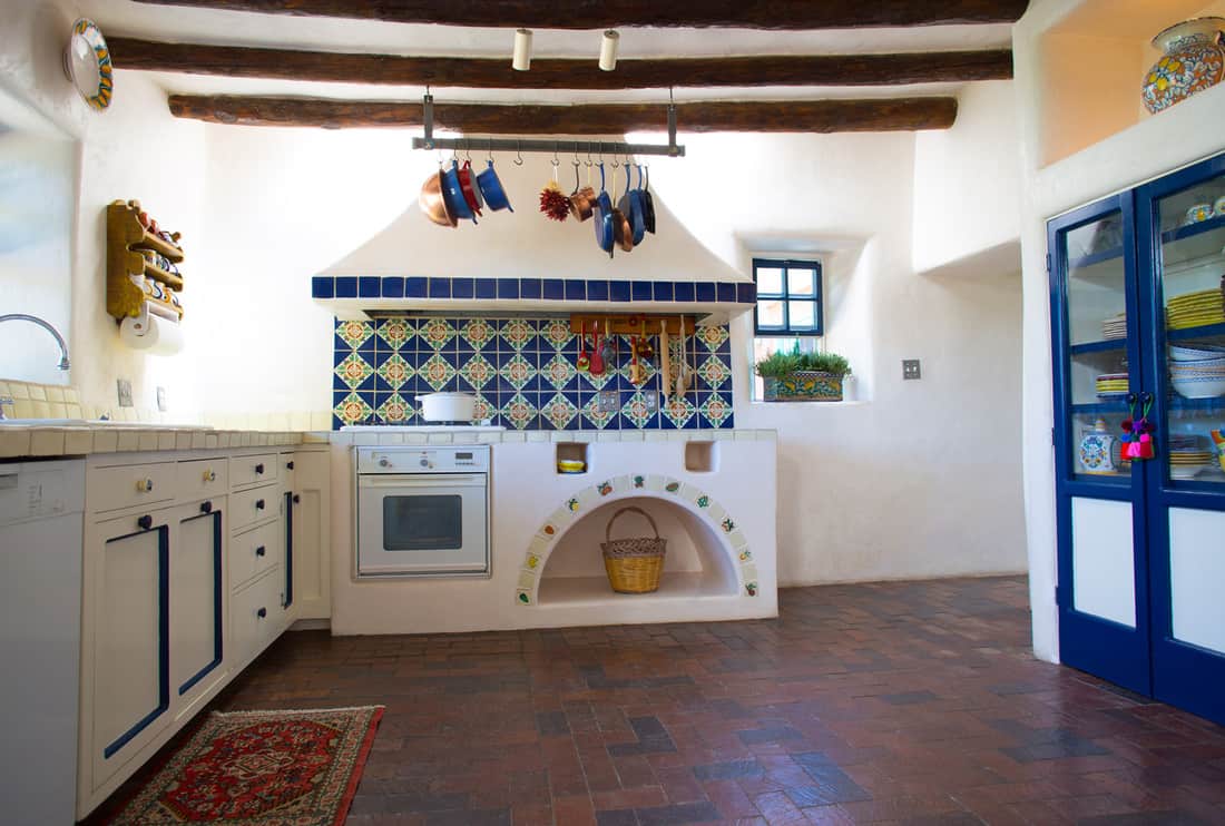 Rustic Southwest USA Kitchen, Old-fashioned brick floor, ceiling beams, counters, drawers, oven
